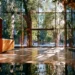 Best Virtual Office 2026- 7 Top Services Compared | Alliance Virtual Offices Modern virtual office building lobby with floor-to-ceiling glass windows, warm wood reception desk, and polished reflective floors overlooking a tree-lined city street