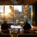 Top Coworking Spaces in the US in 2026- Best Operators City-by-City Picks and How to Choose | Alliance Virtual Offices Two people working on laptops at shared tables in a sunlit coworking space