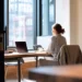Registered Agent vs Virtual Office Address What LLC Owners Need to Know | Alliance Virtual Offices LLC owner working remotely from a modern virtual office space, considering registered agent and business address options