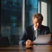 Best Phone System for Solo Attorneys | Alliance Virtual Offices Solo attorney reviewing case documents at his desk with a smartphone nearby