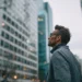 Virtual Office vs PO Box vs CMRA- Which Business Address Solution Is Right for You_ | Alliance Virtual Offices Business owner evaluating business address options in a downtown district