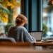 Virtual Business Address for Digital Nomads and Remote Workers | Alliance Virtual Offices Remote worker using a laptop in a cozy café setting, representing digital nomads who use a virtual business address to work from anywhere