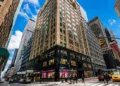 Midtown Manhattan office building on a busy corner, a prime New York City business address location