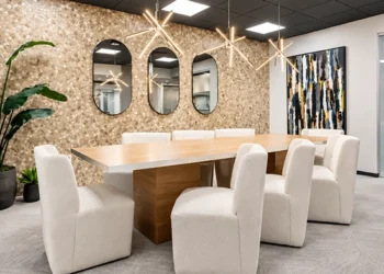 Private meeting room for eight people with conference table and natural light